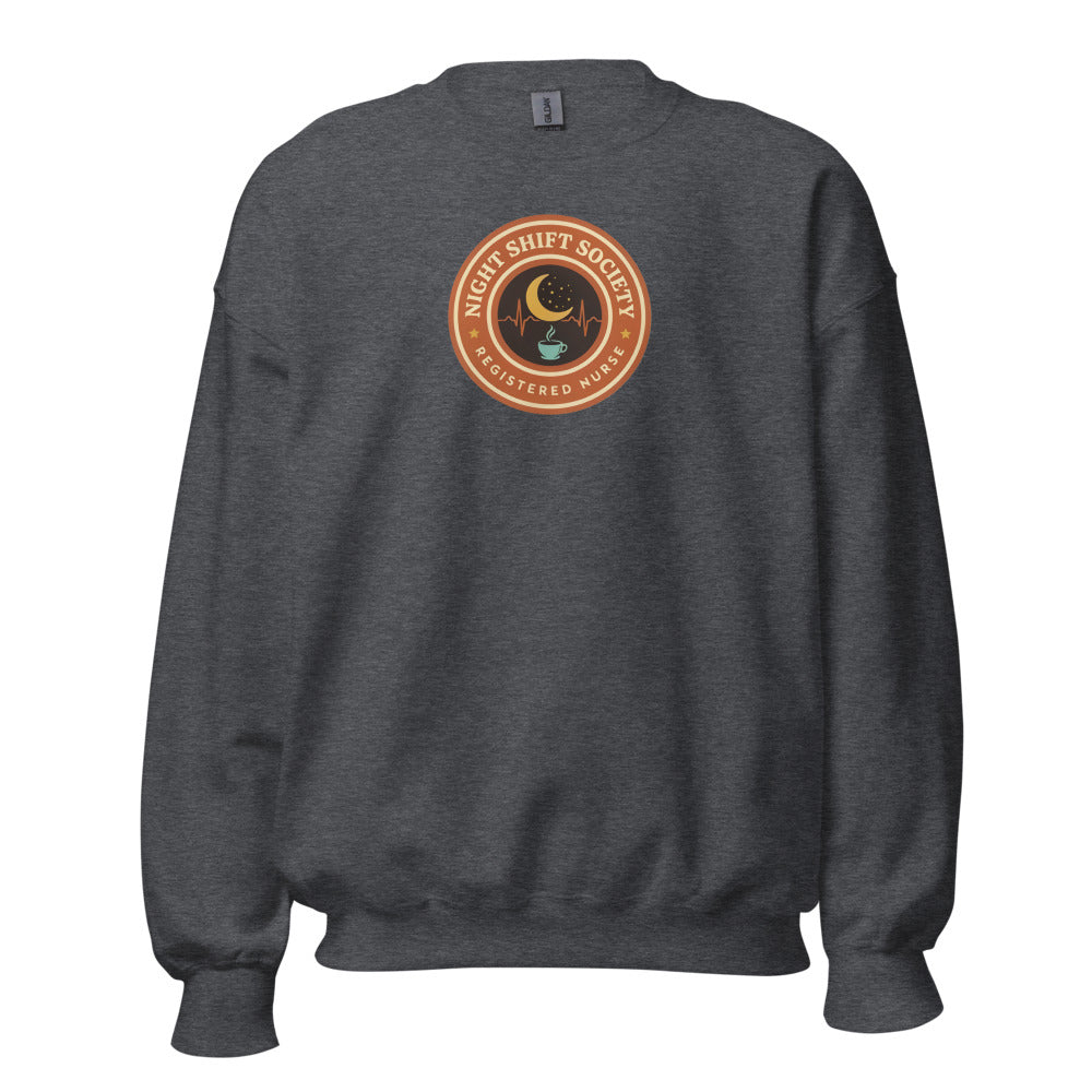 Night Shift Society retro registered nurse badge crewneck sweatshirt — Dark Heather, front