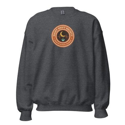 Night Shift Society retro registered nurse badge crewneck sweatshirt — Dark Heather, front