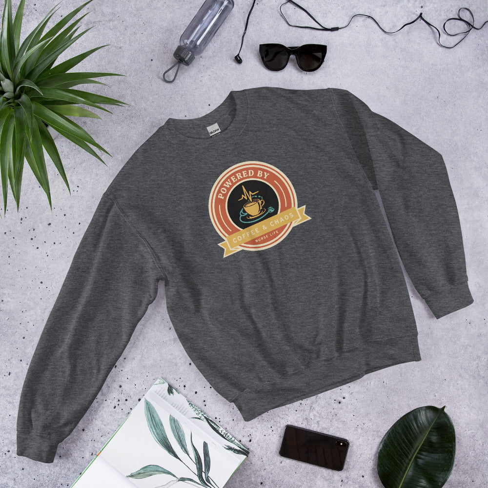 Powered by Coffee & Chaos retro nurse badge crewneck sweatshirt — Dark Heather, front-right