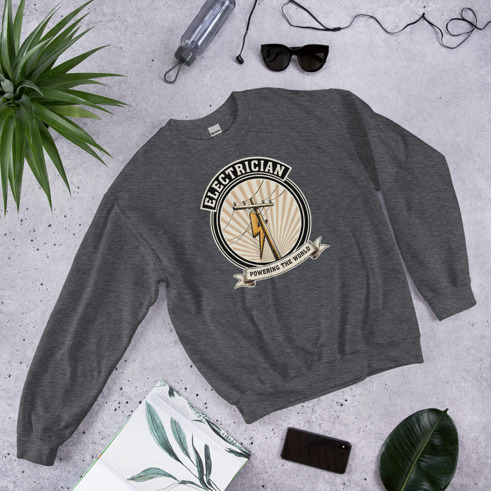 Powering The World electrician emblem crewneck — Dark Heather, flat lay