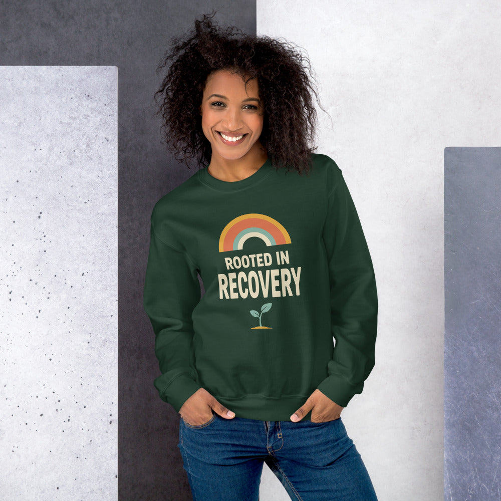 Rooted in Recovery retro rainbow crewneck sweatshirt — Forest Green, on model