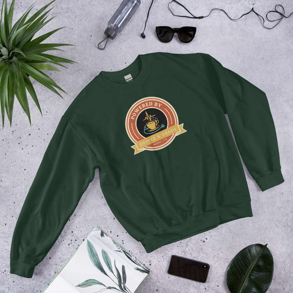 Powered by Coffee & Chaos retro nurse badge crewneck sweatshirt — Forest Green, front-right