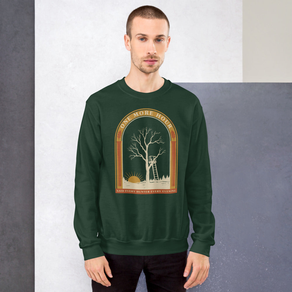 One More Hour funny deer hunting crewneck — Forest Green, on model