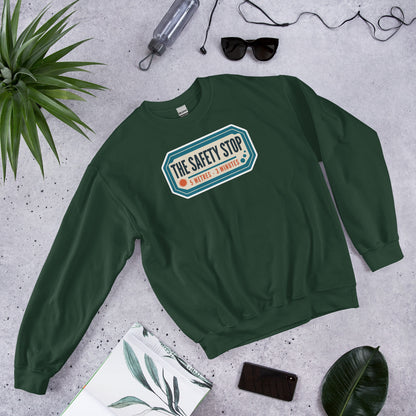 The Safety Stop vintage scuba diving travel decal sweatshirt — Forest Green, flat lay
