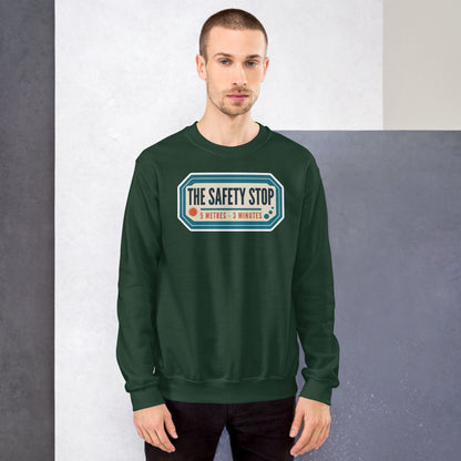 The Safety Stop vintage scuba diving travel decal sweatshirt — Forest Green, on model
