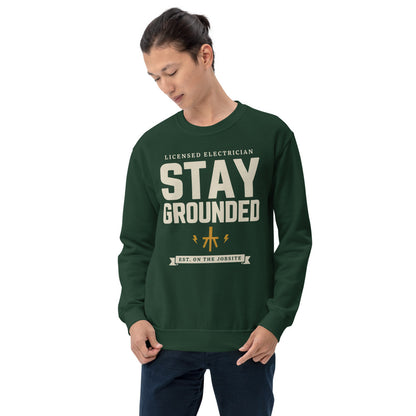Stay Grounded funny electrician crewneck — Forest Green, on model