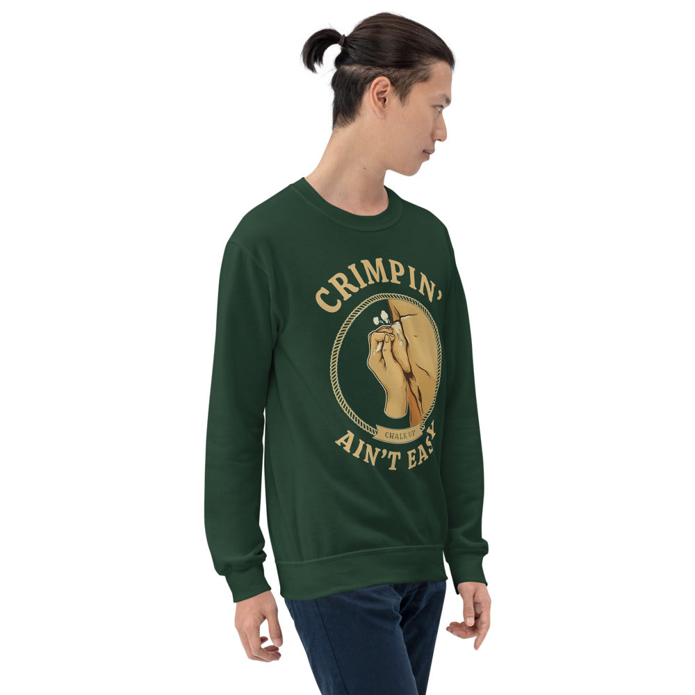 Crimpin' Ain't Easy bouldering badge crewneck sweatshirt — Forest Green, on model