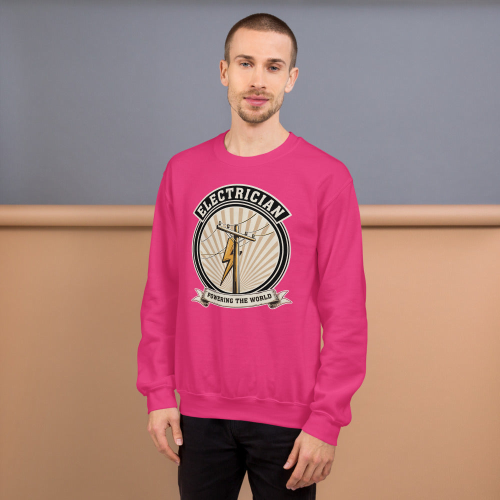 Powering The World electrician emblem crewneck — Heliconia, on model