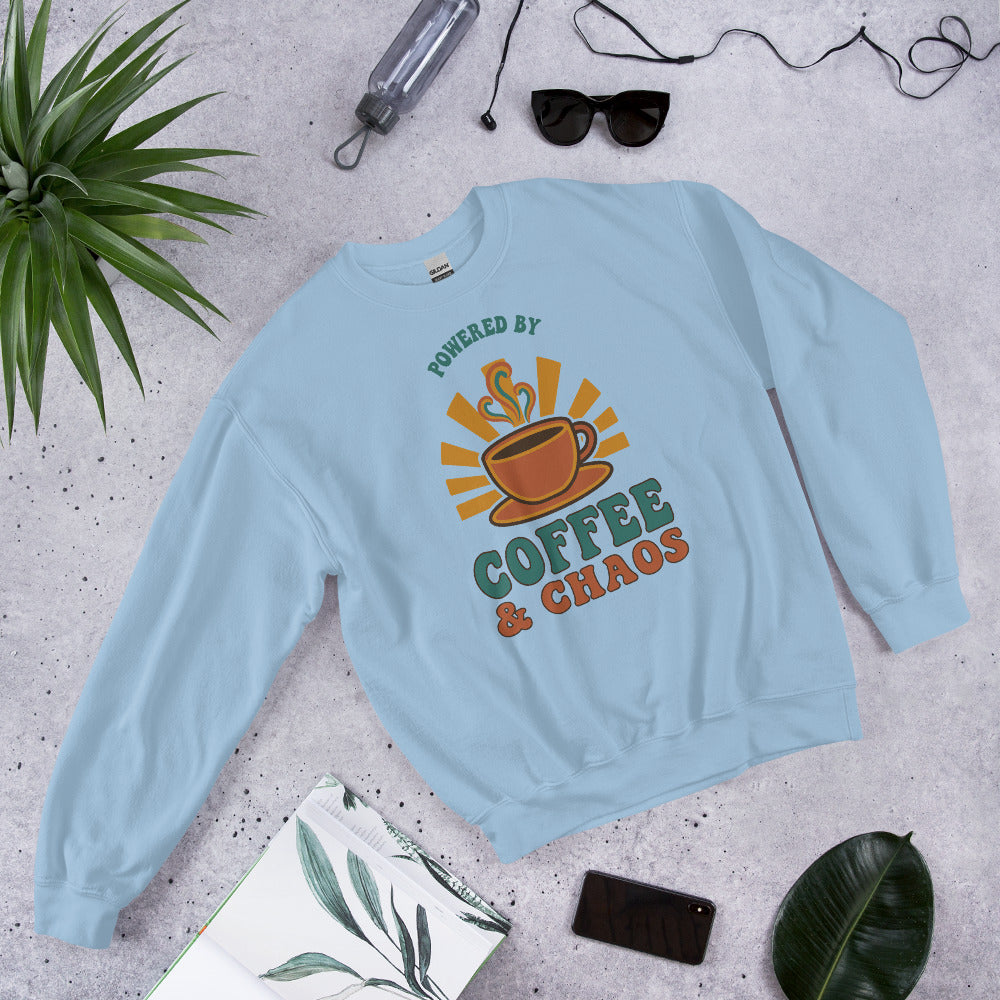 Powered By Coffee And Chaos retro groovy teacher crewneck sweatshirt — Light Blue, front view