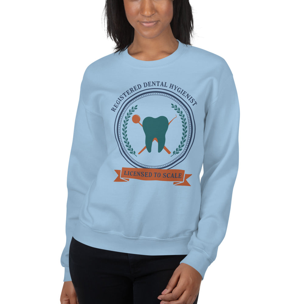 Licensed to Scale registered dental hygienist crewneck sweatshirt — Light Blue, on model