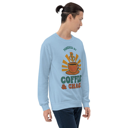 Model wearing Powered By Coffee And Chaos retro groovy teacher crewneck sweatshirt — Light Blue