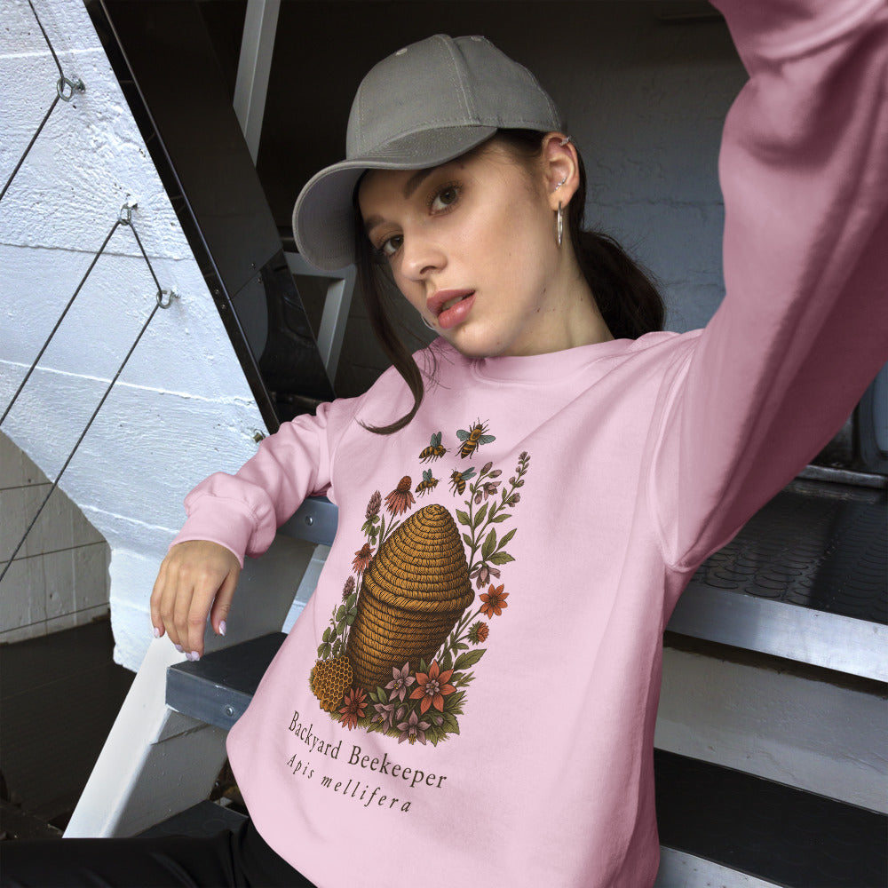 Backyard Beekeeper field-guide bee crewneck sweatshirt — Light Pink, on model