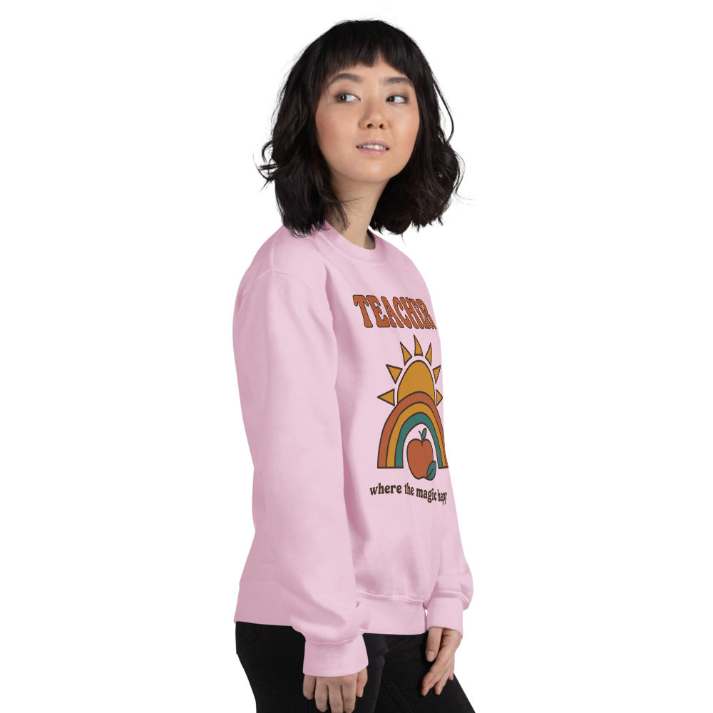 Teacher Where The Magic Happens retro groovy teacher crewneck sweatshirt — Light Pink, on model