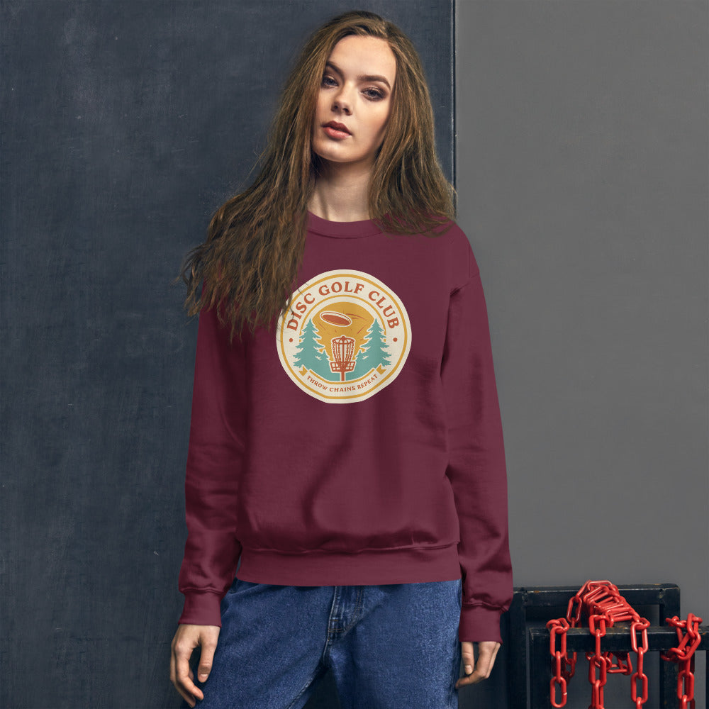 Disc Golf Club retro badge crewneck sweatshirt — Maroon, on model