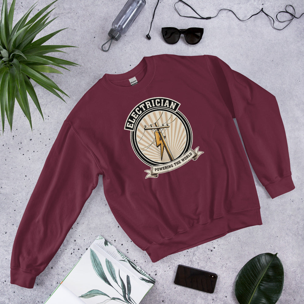 Powering The World electrician emblem crewneck — Maroon, flat lay