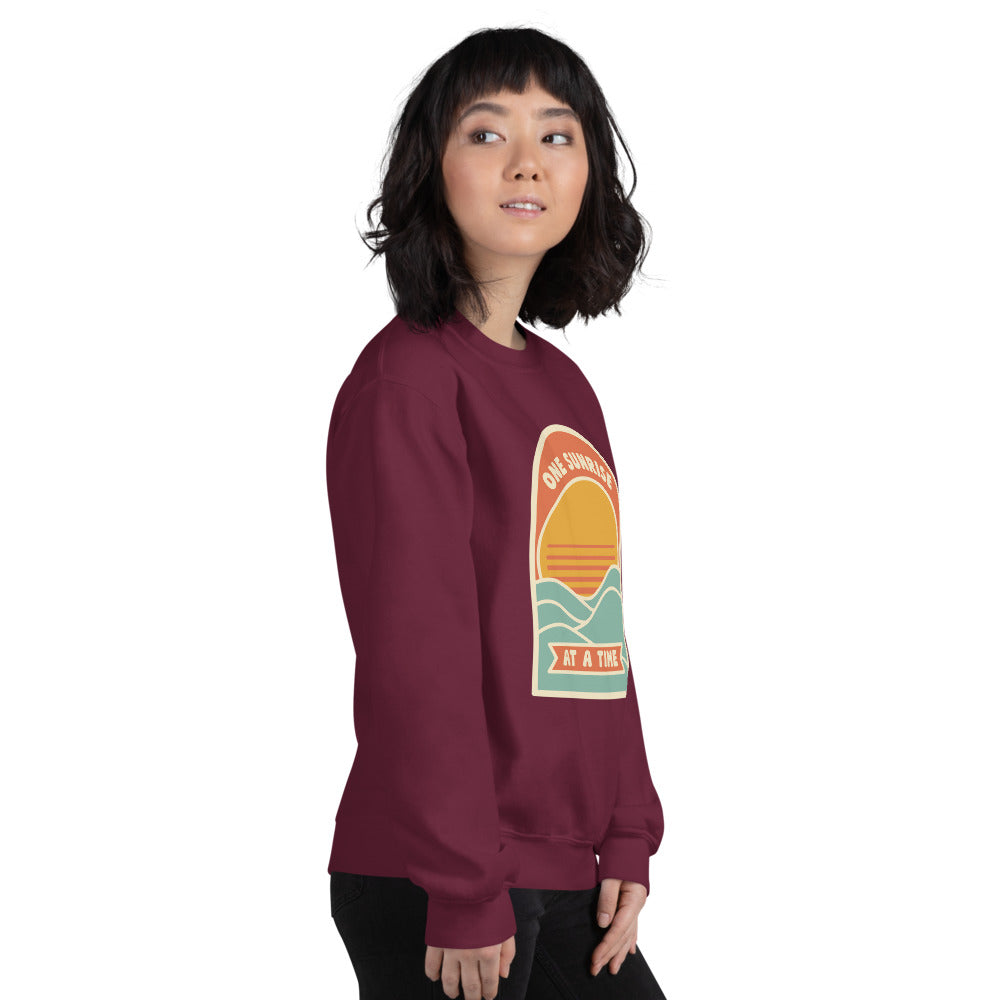 One Sunrise at a Time retro sunrise crewneck sweatshirt — Maroon, on model