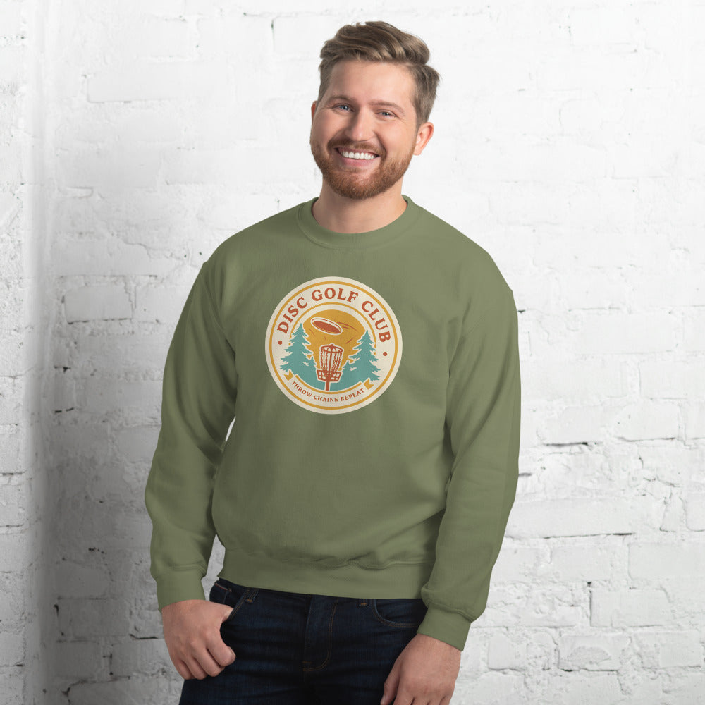 Disc Golf Club retro badge crewneck sweatshirt — Military Green, on model