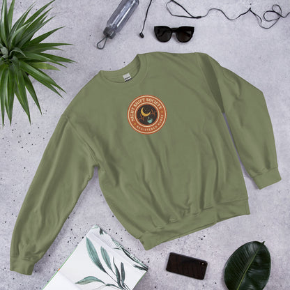 Night Shift Society retro registered nurse badge crewneck sweatshirt — Military Green, front-right
