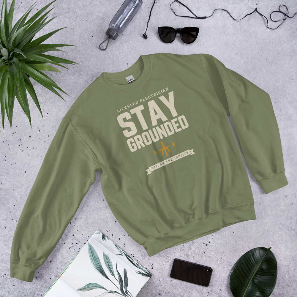 Stay Grounded funny electrician crewneck — Military Green, flat lay
