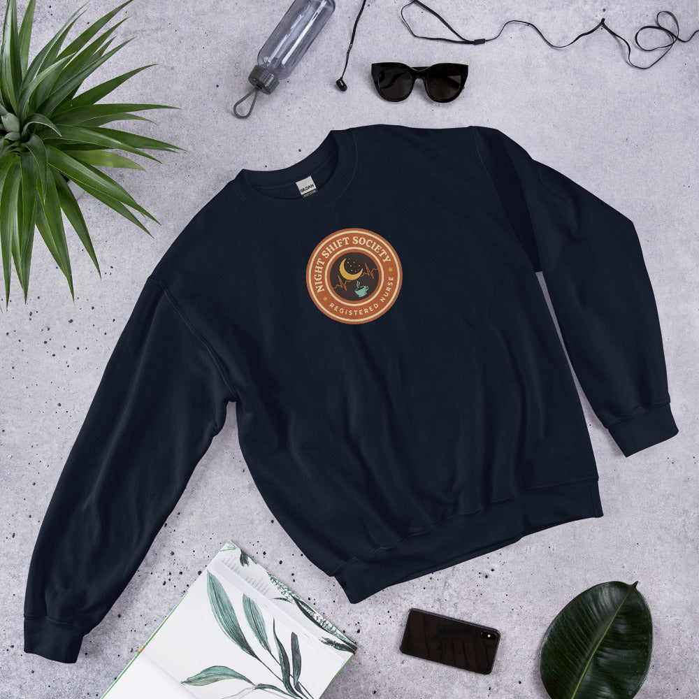 Night Shift Society retro registered nurse badge crewneck sweatshirt — Navy, front-right