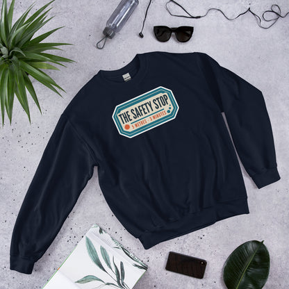 The Safety Stop vintage scuba diving travel decal sweatshirt — Navy, flat lay