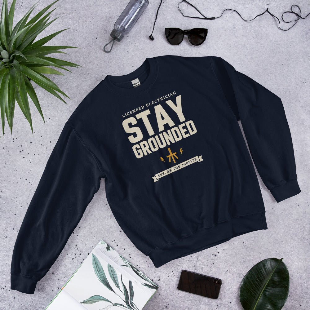 Stay Grounded funny electrician crewneck — Navy, flat lay
