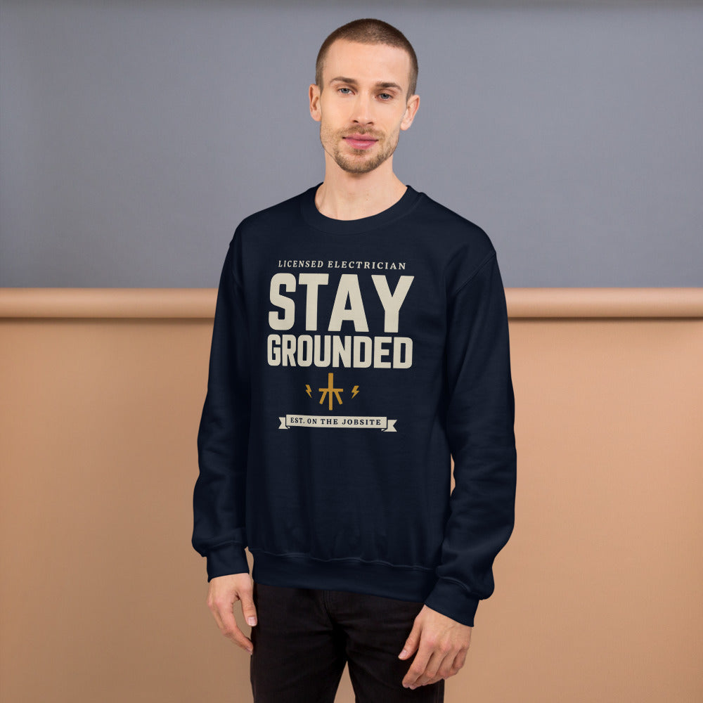 Stay Grounded funny electrician crewneck — Navy, on model