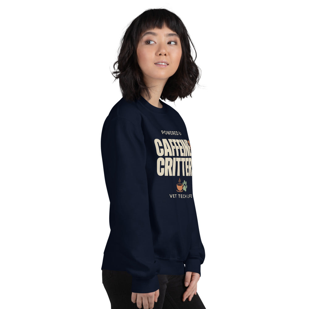 Powered by Caffeine & Critters funny vet tech crewneck sweatshirt — Navy, on model