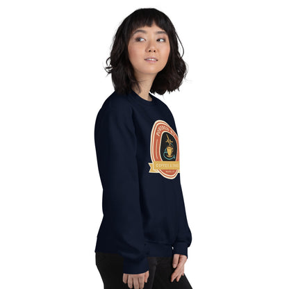 Powered by Coffee & Chaos retro nurse badge crewneck sweatshirt — Navy, on model