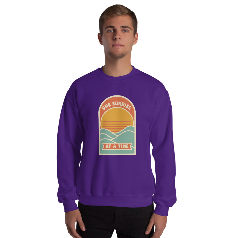 One Sunrise at a Time retro sunrise crewneck sweatshirt — Purple, on model