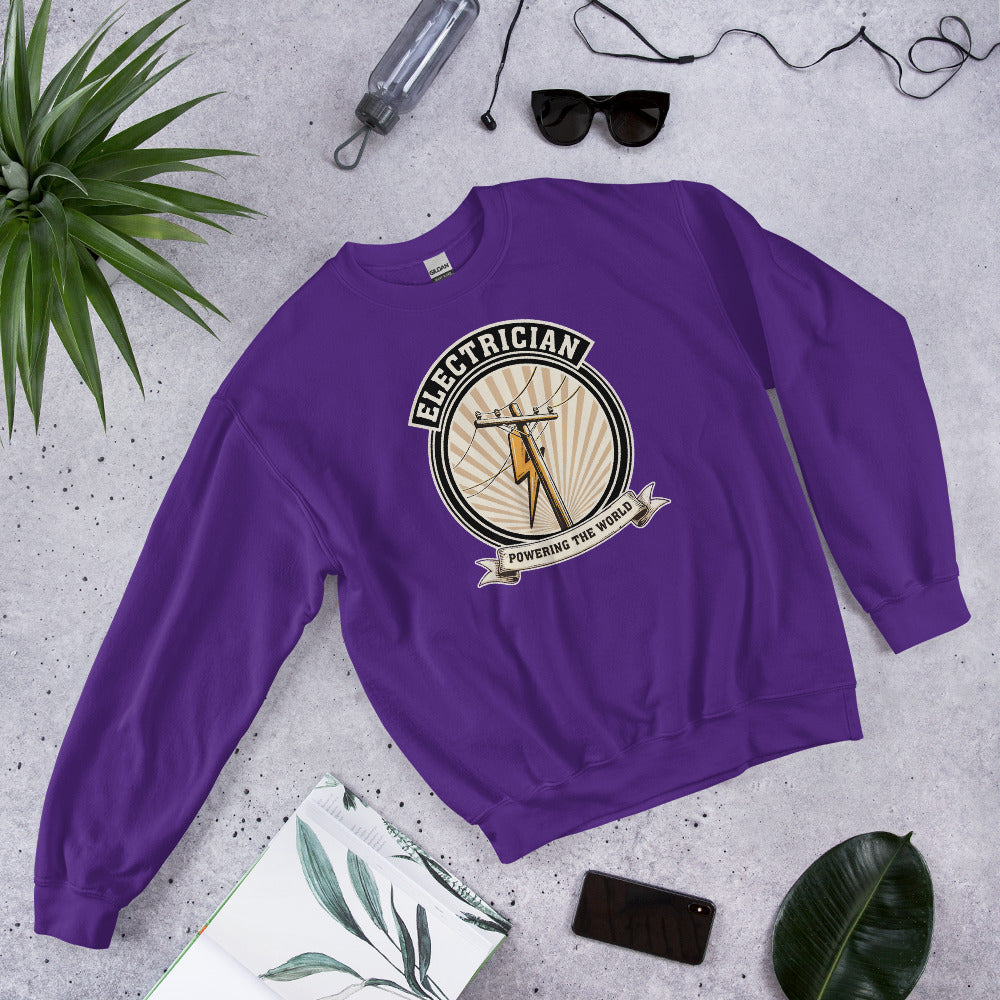 Powering The World electrician emblem crewneck — Purple, flat lay
