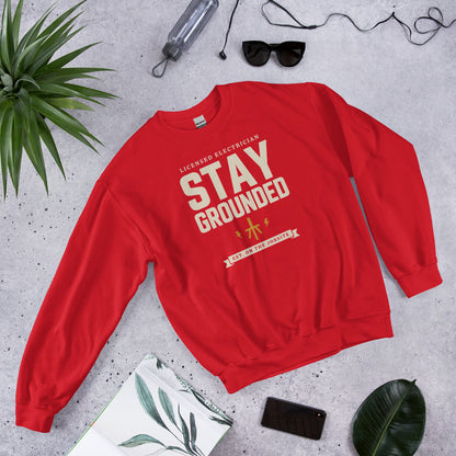 Stay Grounded funny electrician crewneck — Red, flat lay