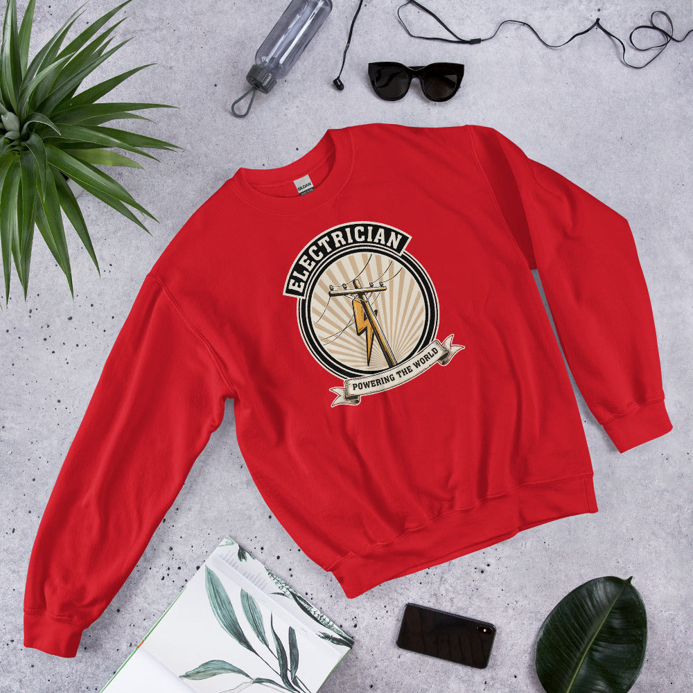 Powering The World electrician emblem crewneck — Red, flat lay