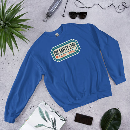 The Safety Stop vintage scuba diving travel decal sweatshirt — Royal, flat lay
