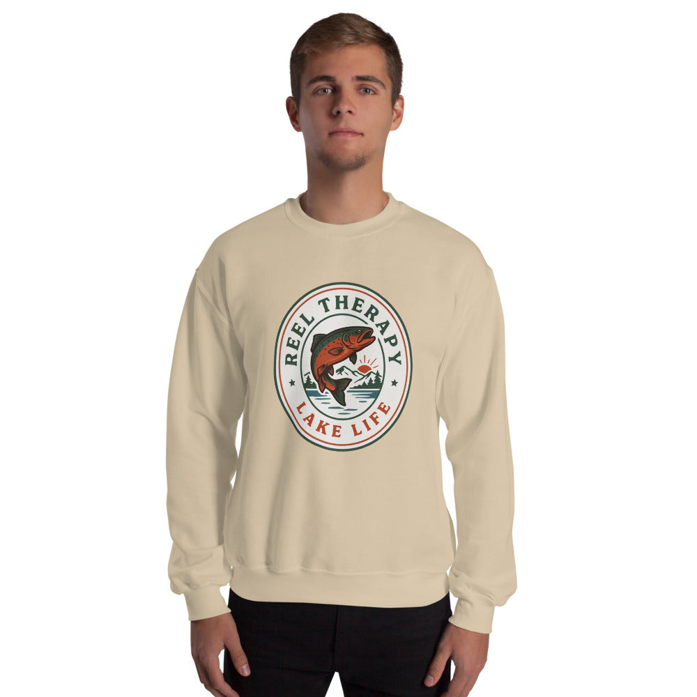 Reel Therapy retro national-park trout badge fishing crewneck sweatshirt — Sand, on model