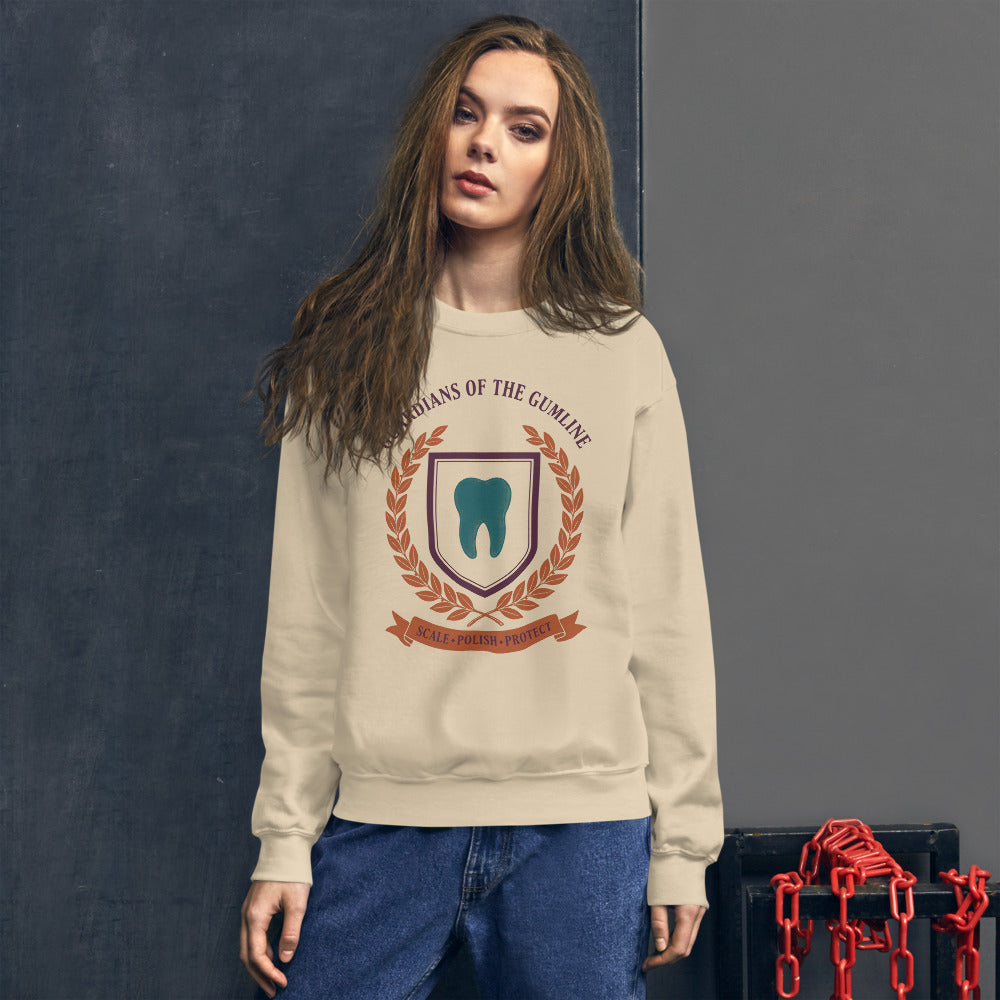 Guardians of the Gumline dental hygienist crewneck sweatshirt — Sand, on model