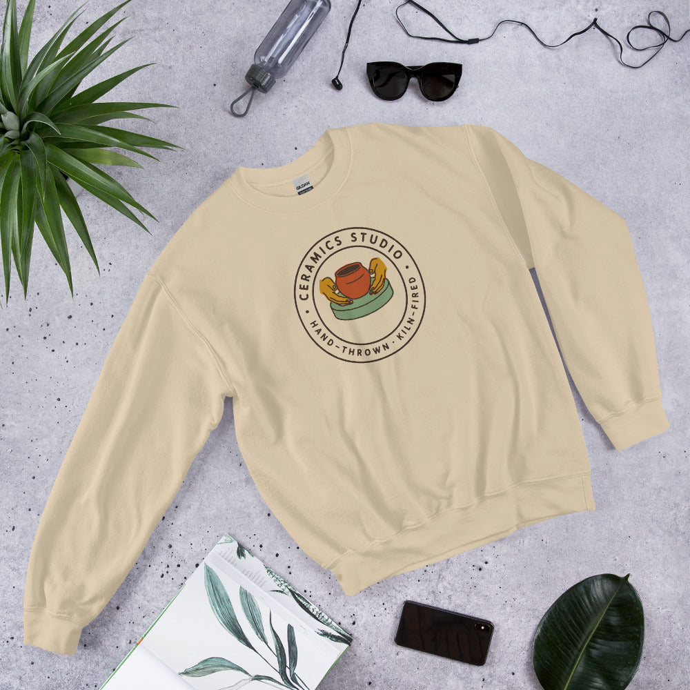 Ceramics Studio Badge hand-thrown pottery crewneck sweatshirt — Sand, flat lay