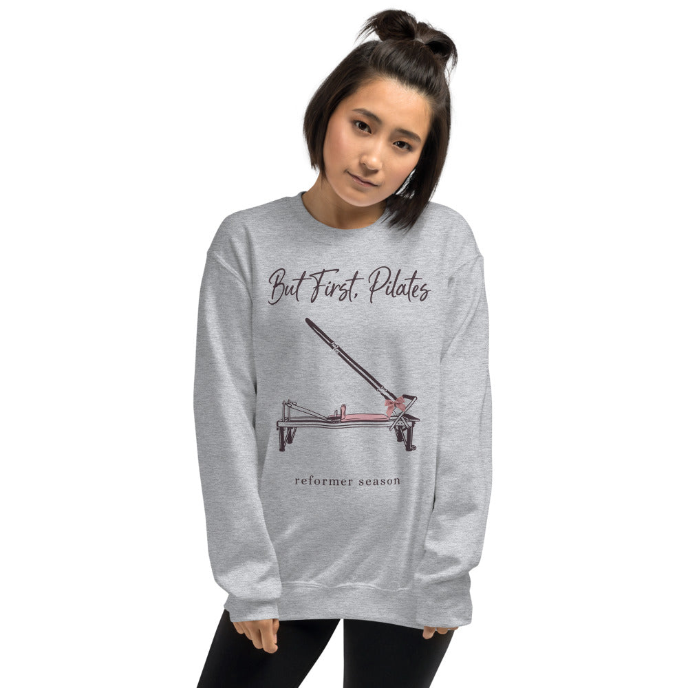 But First Pilates reformer line-art crewneck sweatshirt — Sport Grey, on model