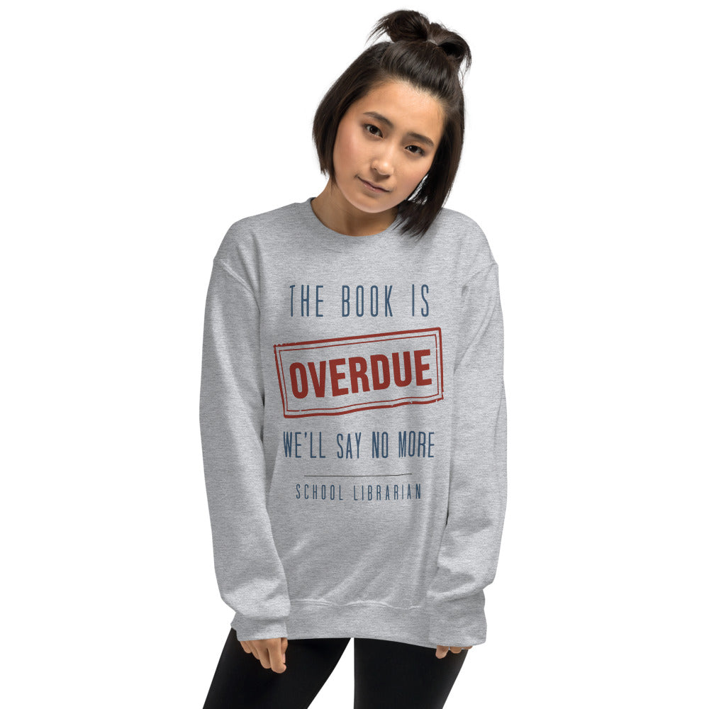 The Book Is Overdue funny school librarian crewneck sweatshirt — Sport Grey, on model