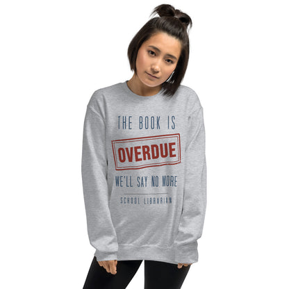 The Book Is Overdue funny school librarian crewneck sweatshirt — Sport Grey, on model