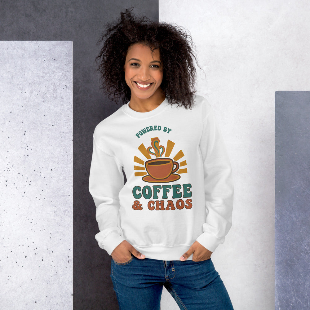 Model wearing Powered By Coffee And Chaos retro groovy teacher crewneck sweatshirt — White