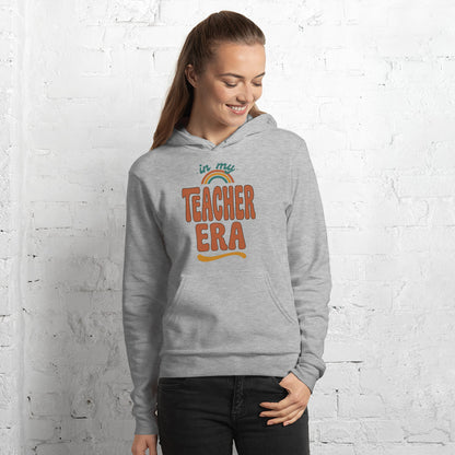 In My Teacher Era retro groovy teacher hoodie — Athletic Heather, on model