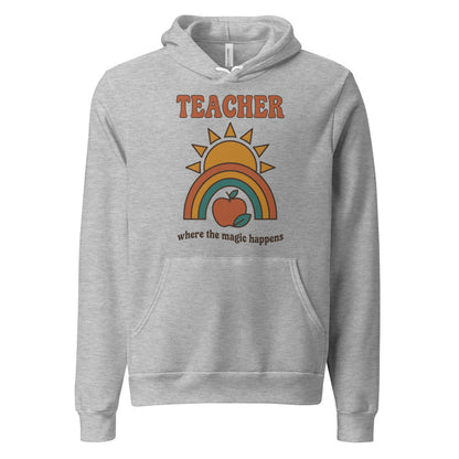 Teacher Where The Magic Happens retro groovy teacher hoodie — Athletic Heather, front