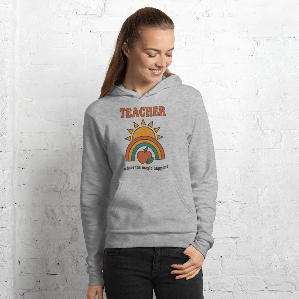 Teacher Where The Magic Happens retro groovy teacher hoodie — Athletic Heather, on model