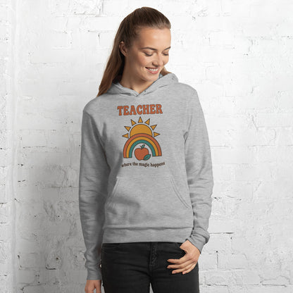 Teacher Where The Magic Happens retro groovy teacher hoodie — Athletic Heather, on model