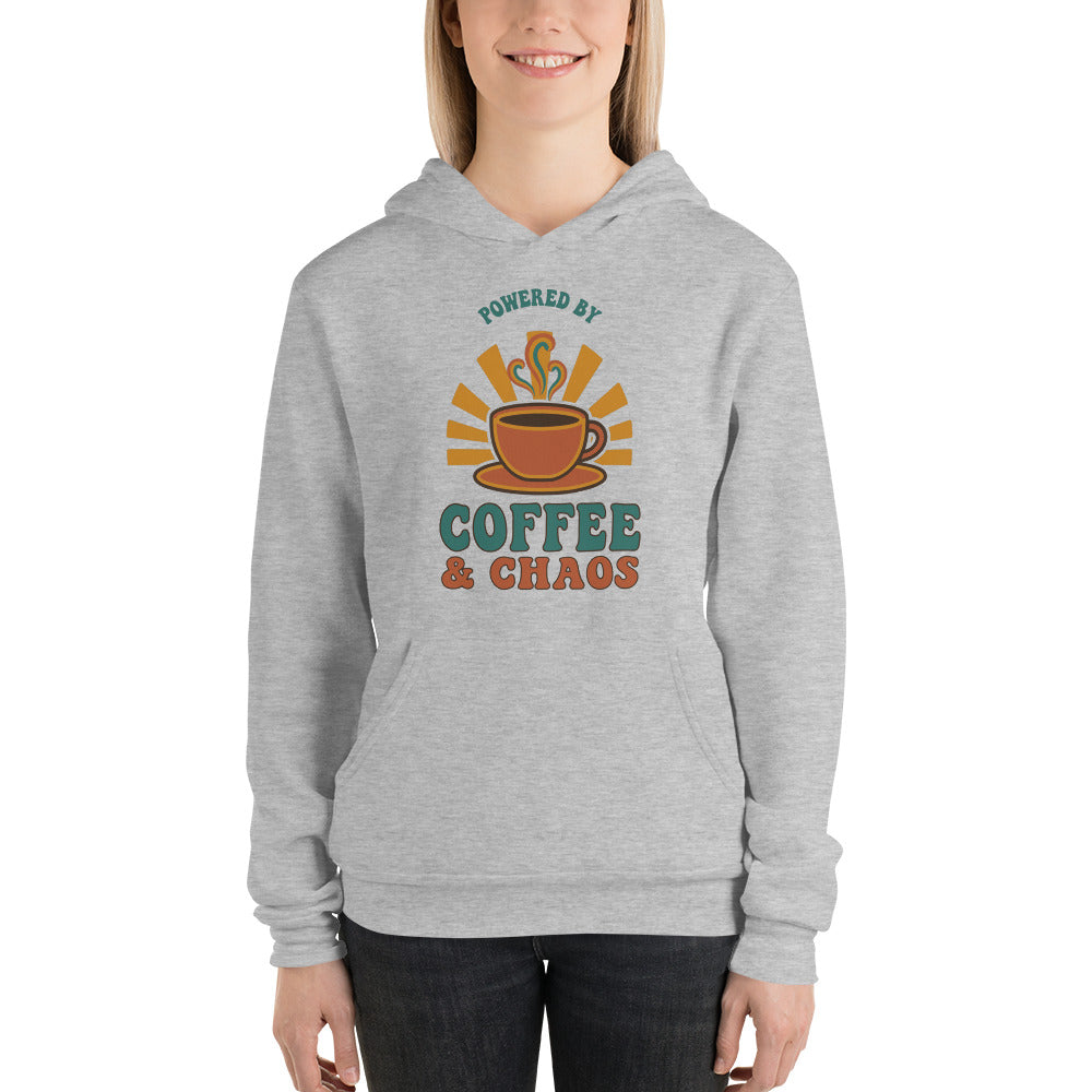 Powered By Coffee And Chaos retro groovy teacher hoodie — Athletic Heather, on model