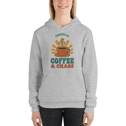 Powered By Coffee And Chaos retro groovy teacher hoodie — Athletic Heather, on model