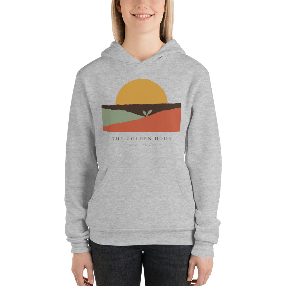 The Golden Hour birth worker doula hoodie — Athletic Heather, on model