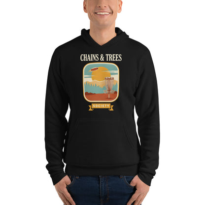 Chains & Trees Society disc golf retro landscape hoodie — Black, on model