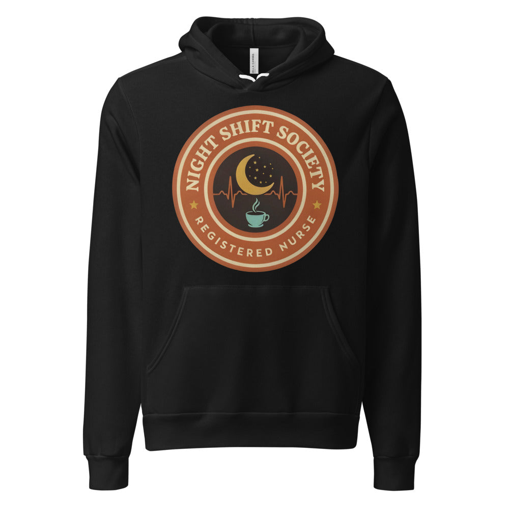 Night Shift Society retro registered nurse badge hoodie — Black, front